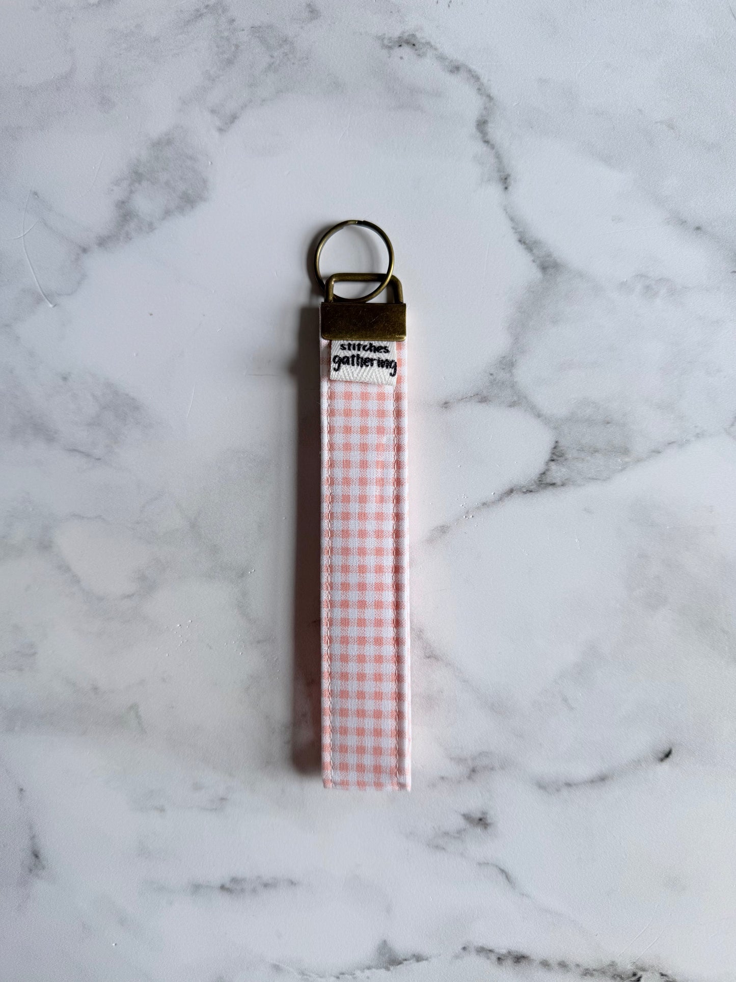 ROSE GINGHAM WRISTLET
