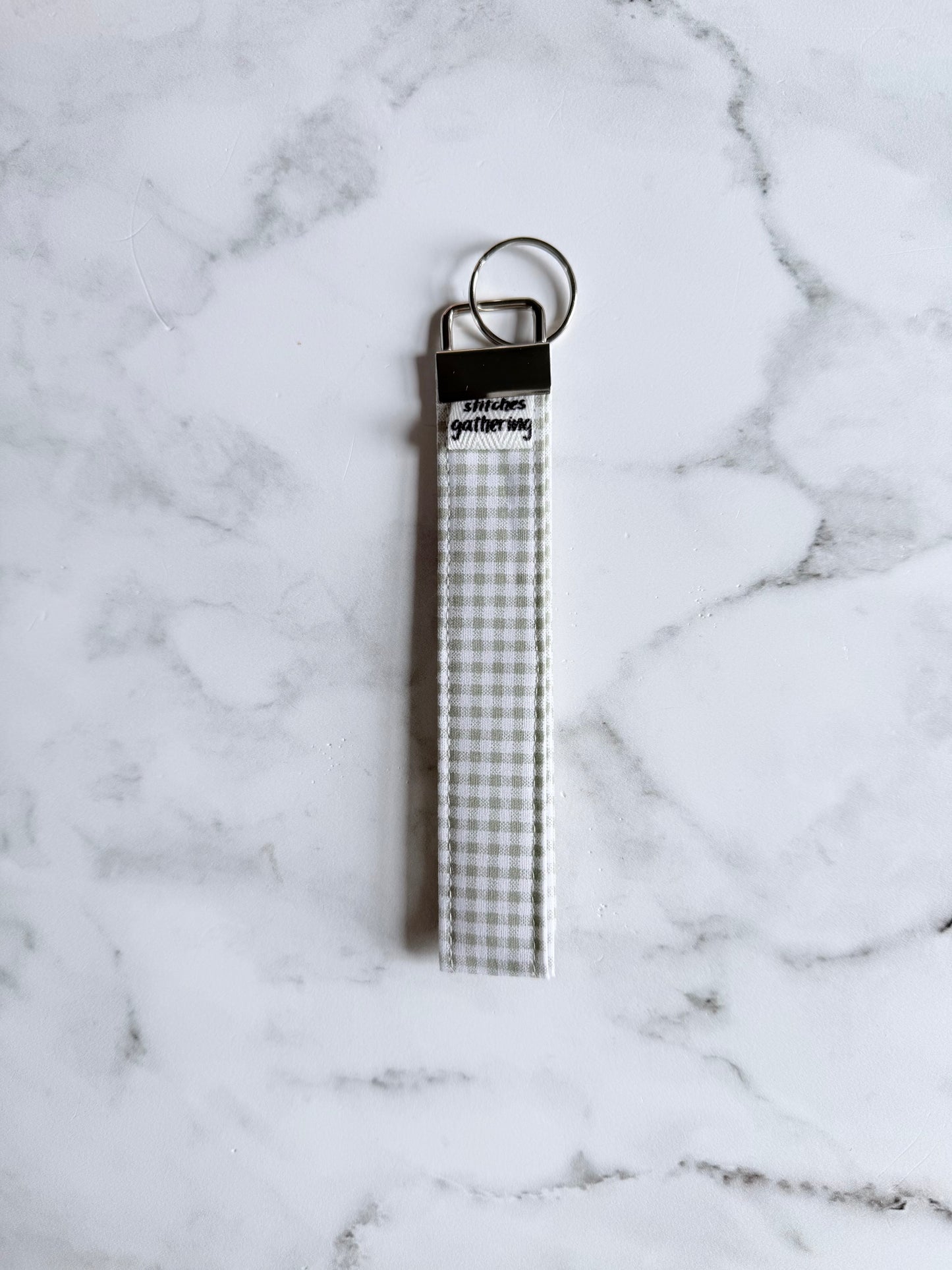 SAGE GINGHAM WRISTLET