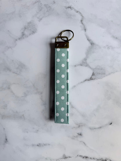 SAGE POLKA DOT WRISTLET
