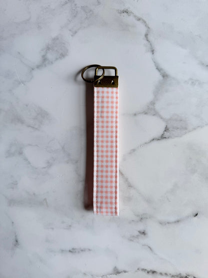 ROSE GINGHAM WRISTLET